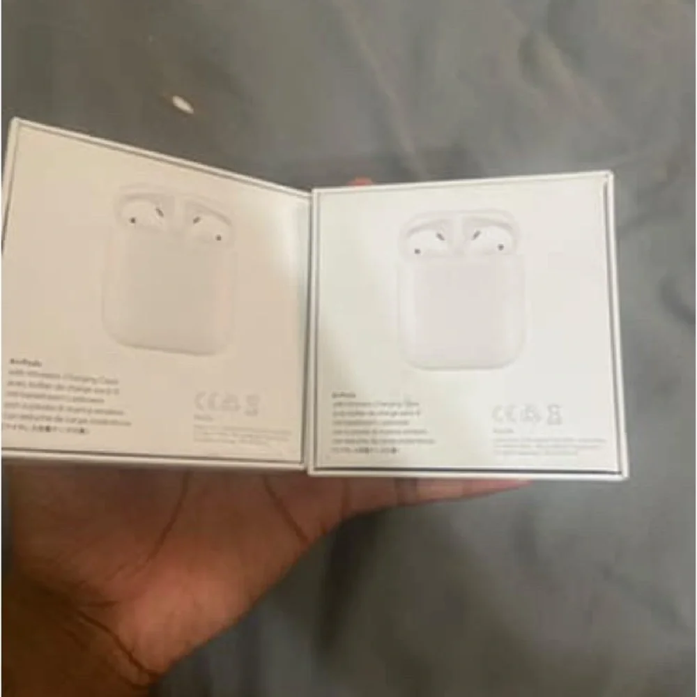 Apple Dual Wireless Earbuds with Charging Cases - White